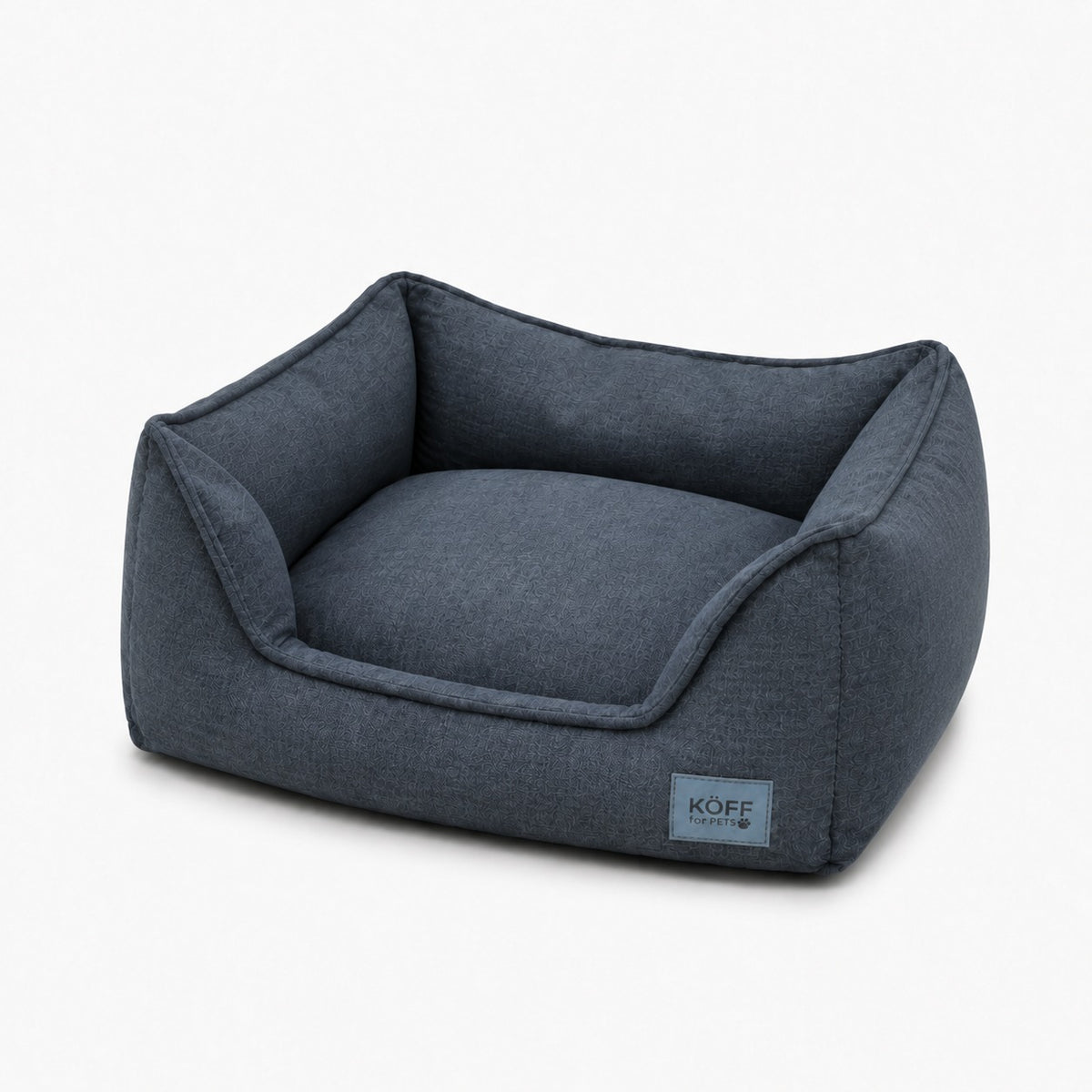 Cama Köff Suite Clásica en azul noche, vista de tres cuartos sobre fondo blanco